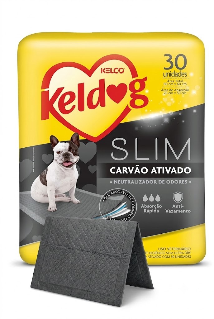 Fardo Keldog Slim Ultra Dry Carvão Ativado com um tapete de face escura ao lado.
